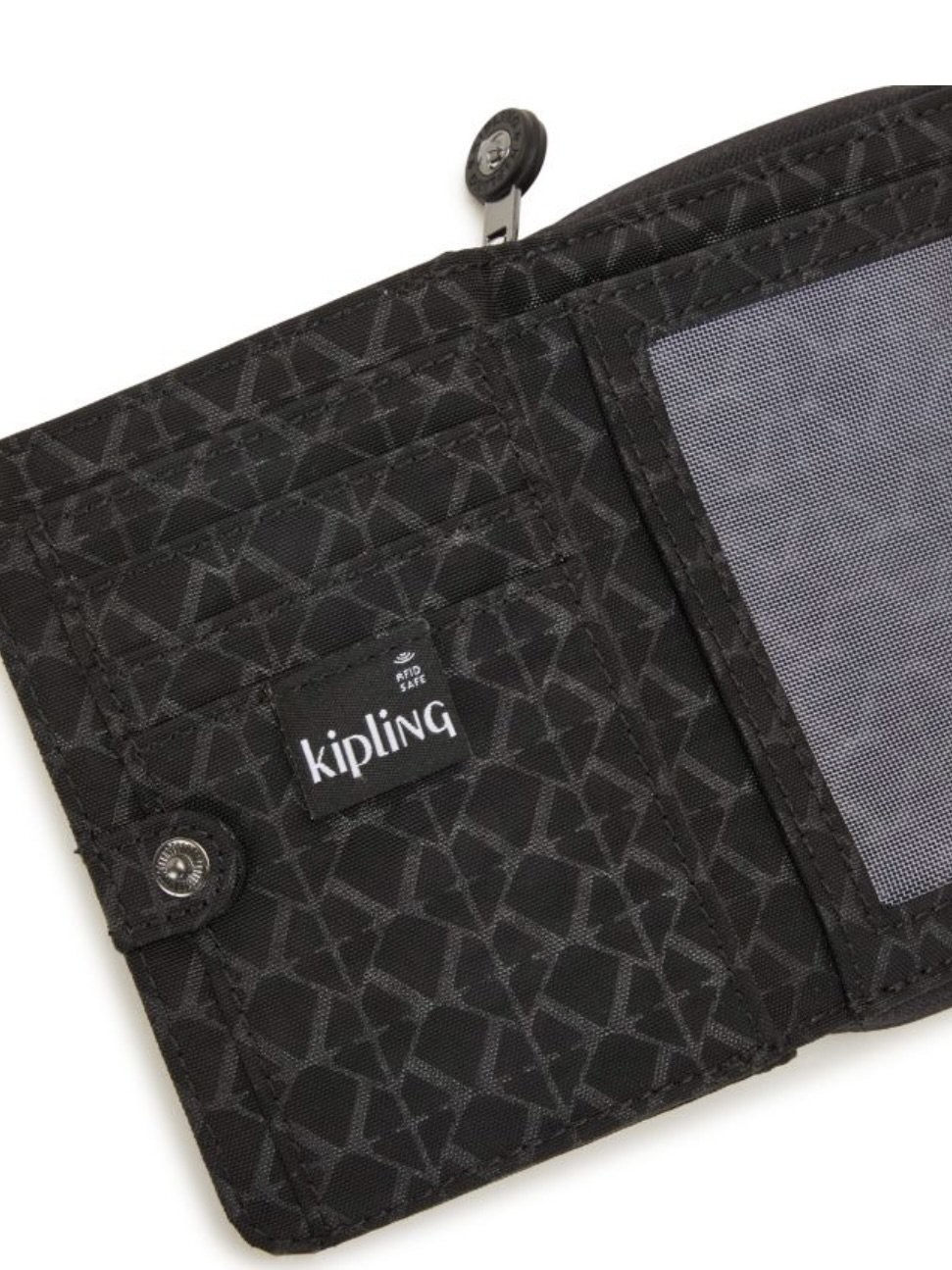 Inside of black patterned wallet displaying several card slots